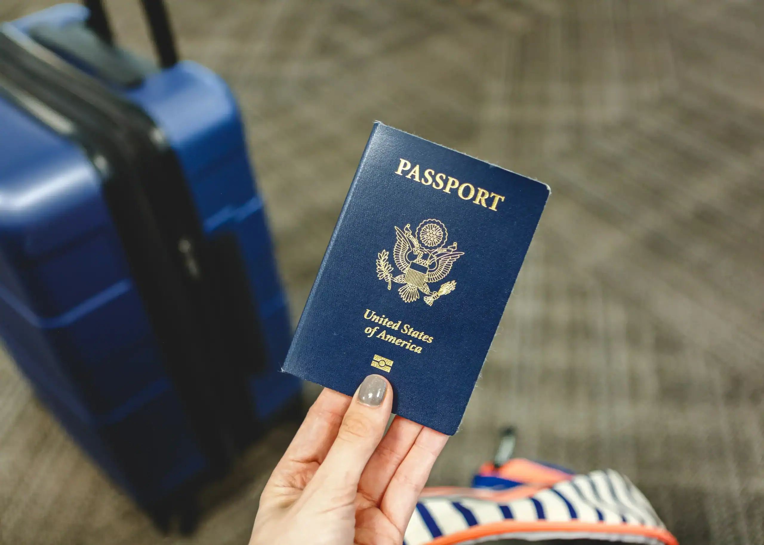 woman with global entry holding a US passport